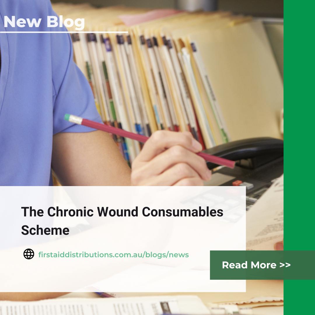 Aged care clinical lead reviewing wound care documentation at a nurses' station