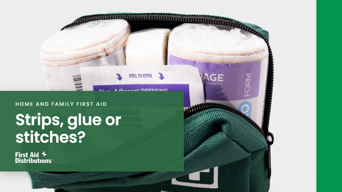 Strips, glue or stitches? An open green soft first aid kit showing rolled bandages, tape and a non-adherent dressing, First Aid Distributions