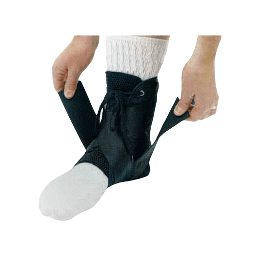 Left medium Purecare Leaf Spring AFO brace by OTS, designed for ankle and foot support, with a lightweight leaf spring design.